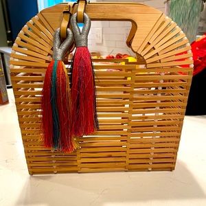 Wooden summer bag with rainbow tassels